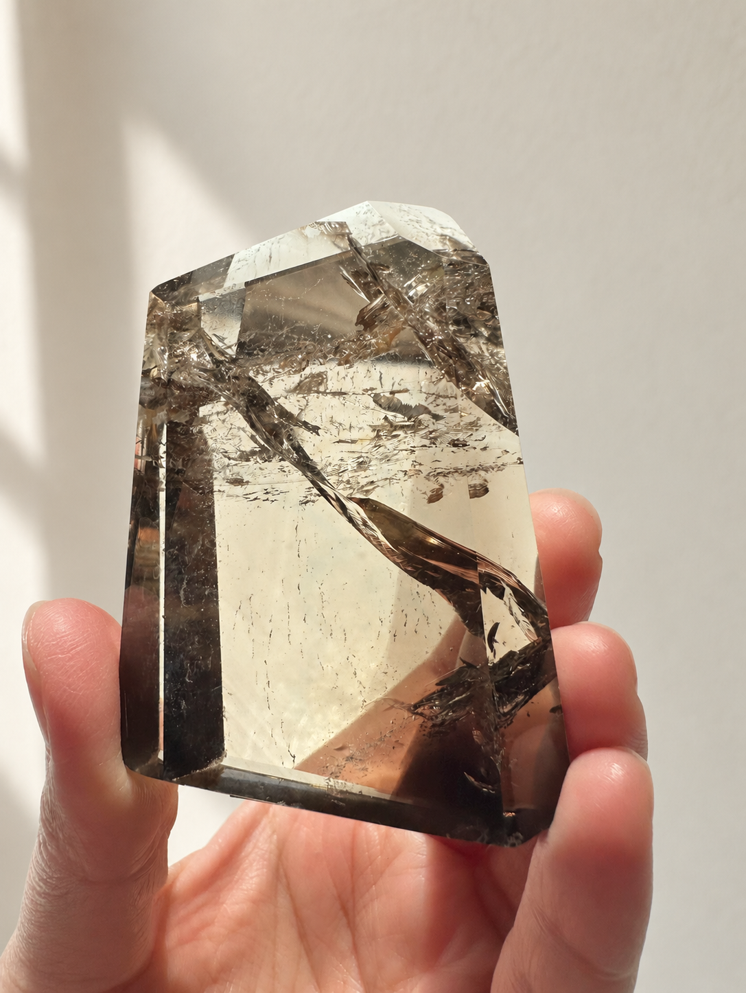 Exact citrine piece #1, 116g — main photo with soft indoor natural light and cream wall background