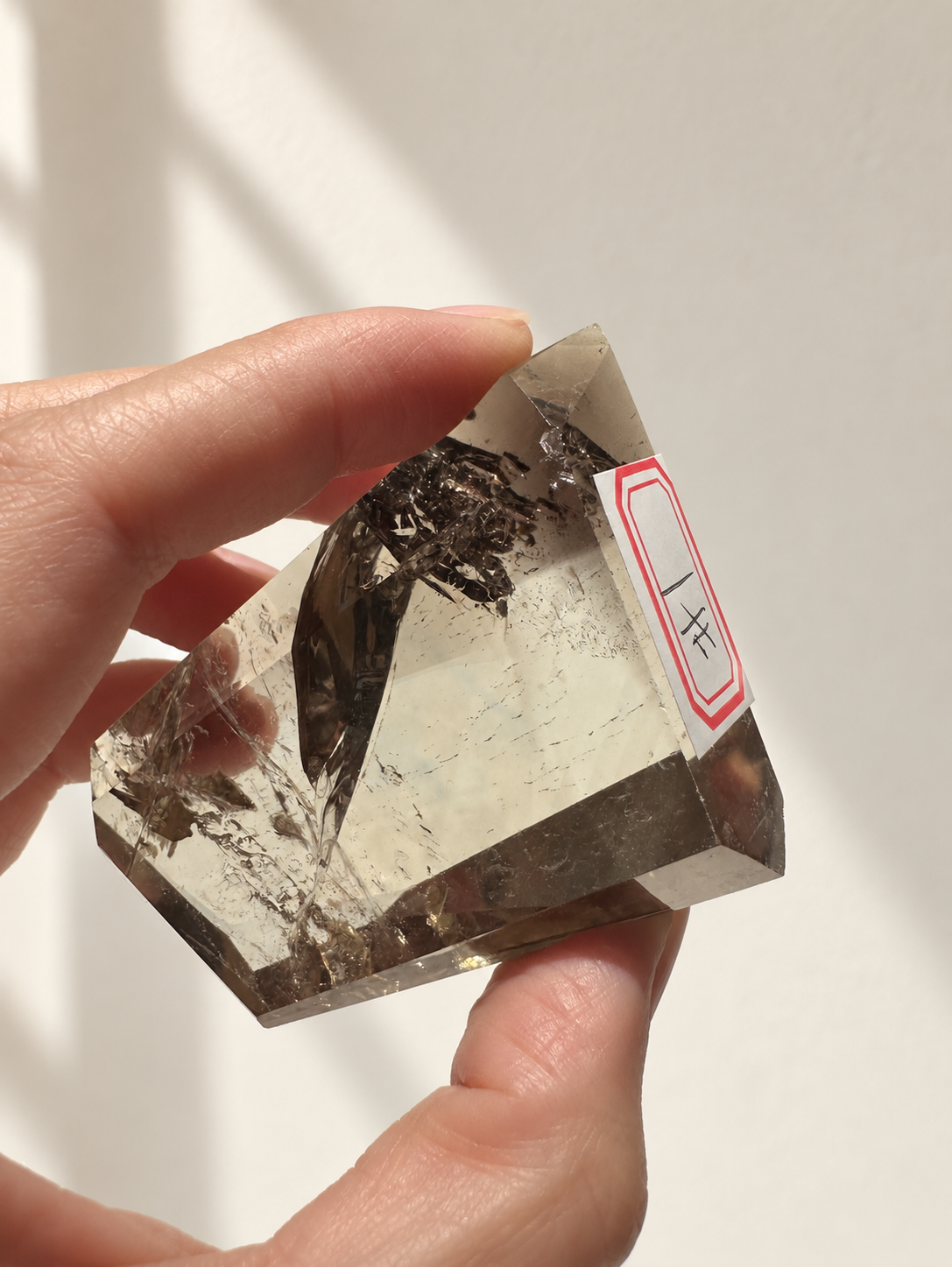 Natural Brazilian citrine 116g exact piece #1 view 5 in soft natural daylight against warm ivory wall