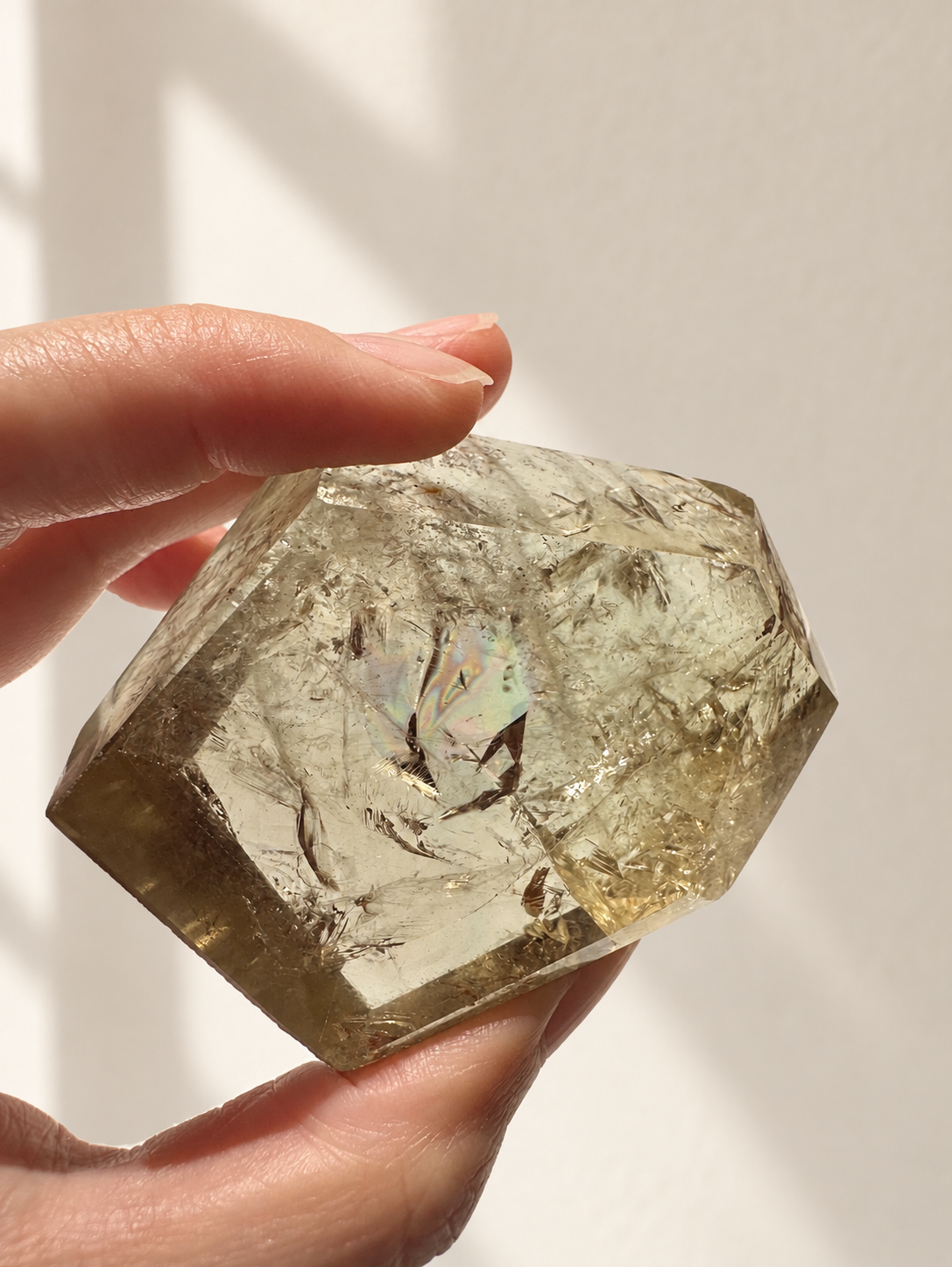 Natural Brazilian citrine 118g exact piece #12 view 3 in soft natural daylight against warm ivory wall