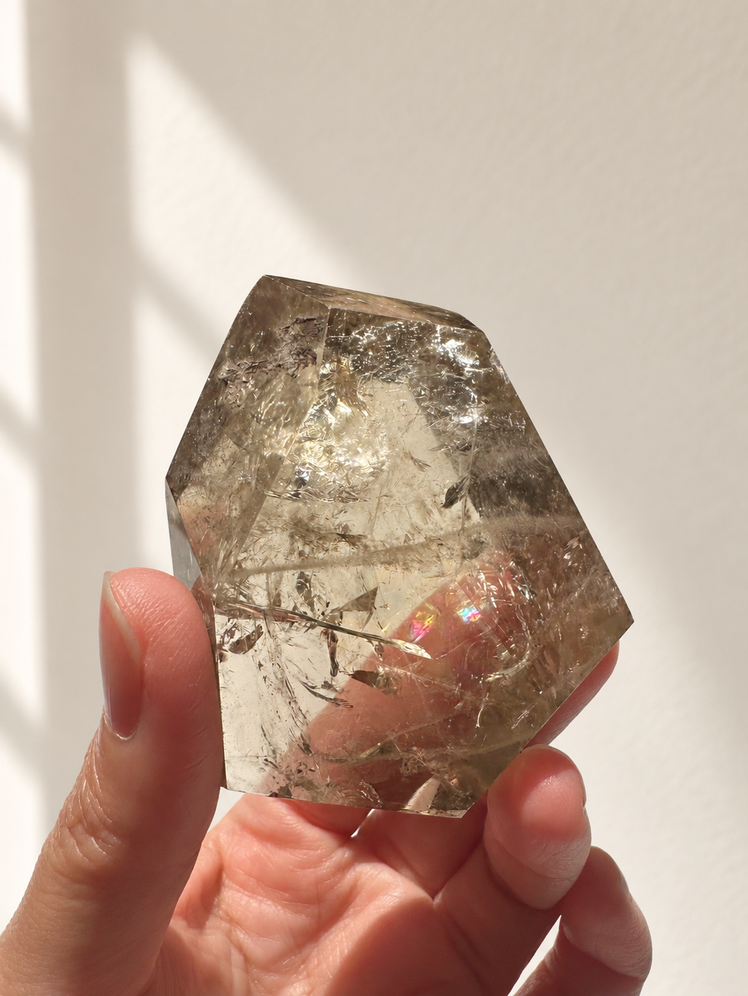 Natural Brazilian citrine 118g exact piece #12 view 5 in soft natural daylight against warm ivory wall