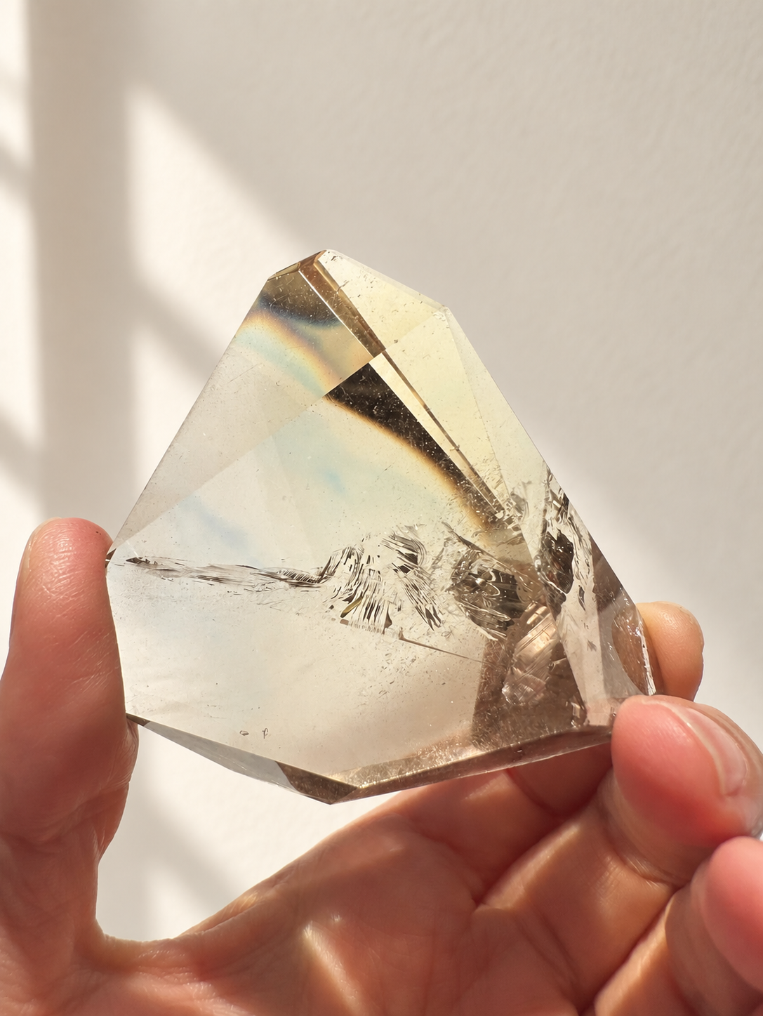 Exact citrine piece #4, 129g — main photo with soft indoor natural light and cream wall background