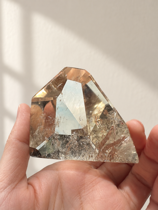 Exact citrine piece #9, 164g — main photo with soft indoor natural light and cream wall background