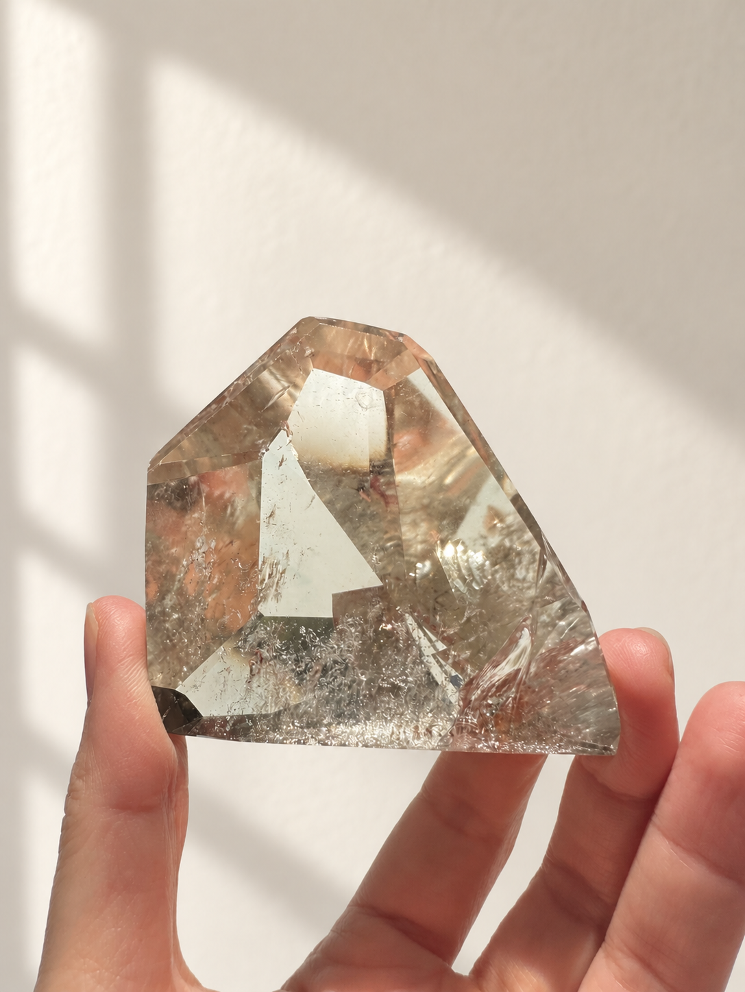 Natural Brazilian citrine 164g exact piece #9 view 12 in soft natural daylight against warm ivory wall