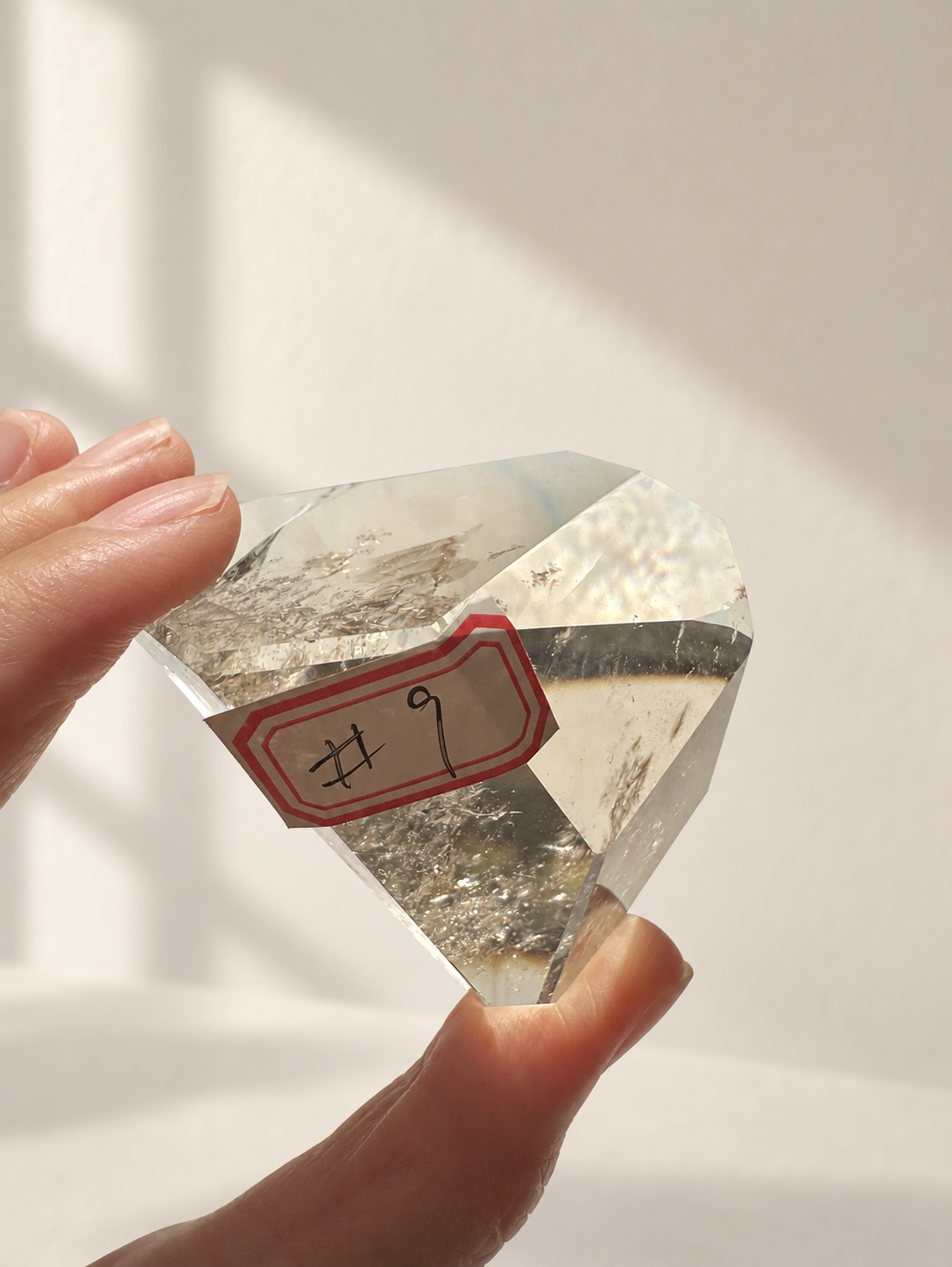 Natural Brazilian citrine 164g exact piece #9 view 13 in soft natural daylight against warm ivory wall