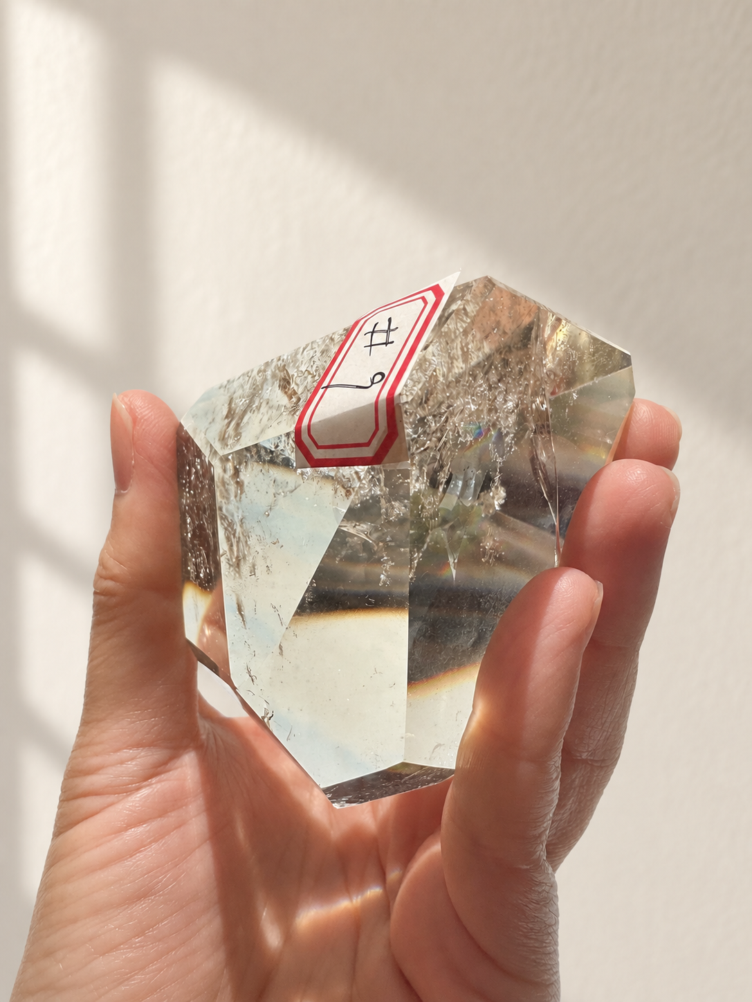 Natural Brazilian citrine 164g exact piece #9 view 17 in soft natural daylight against warm ivory wall