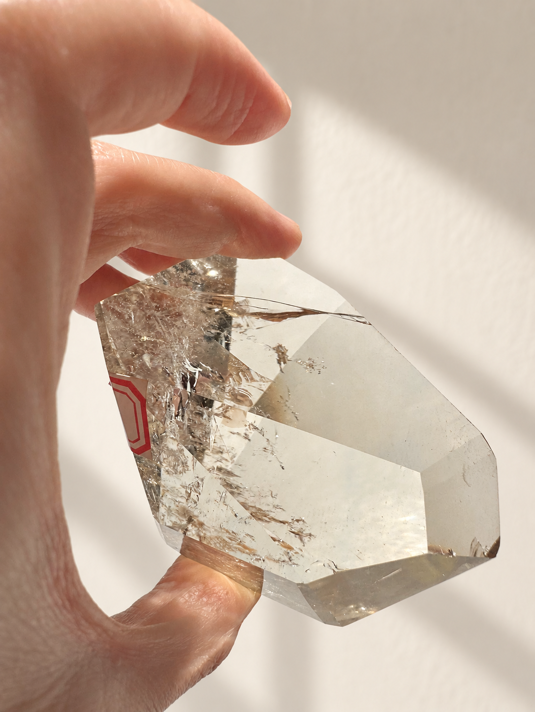 Natural Brazilian citrine 164g exact piece #9 view 3 in soft natural daylight against warm ivory wall