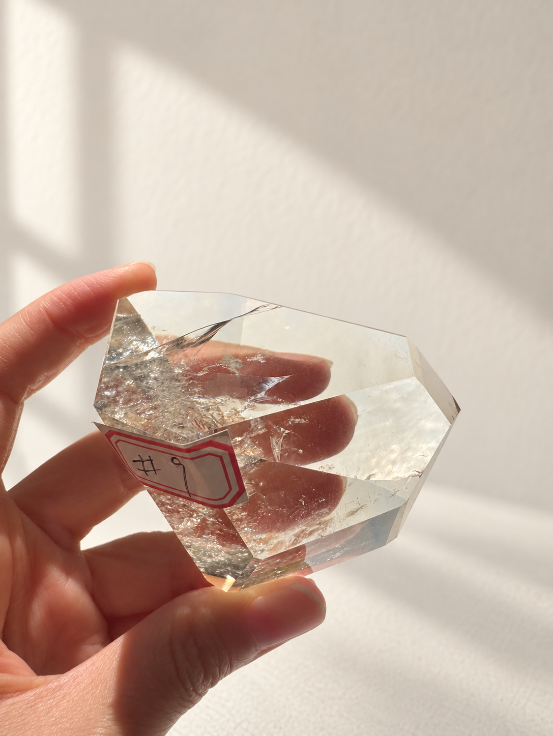 Natural Brazilian citrine 164g exact piece #9 view 4 in soft natural daylight against warm ivory wall