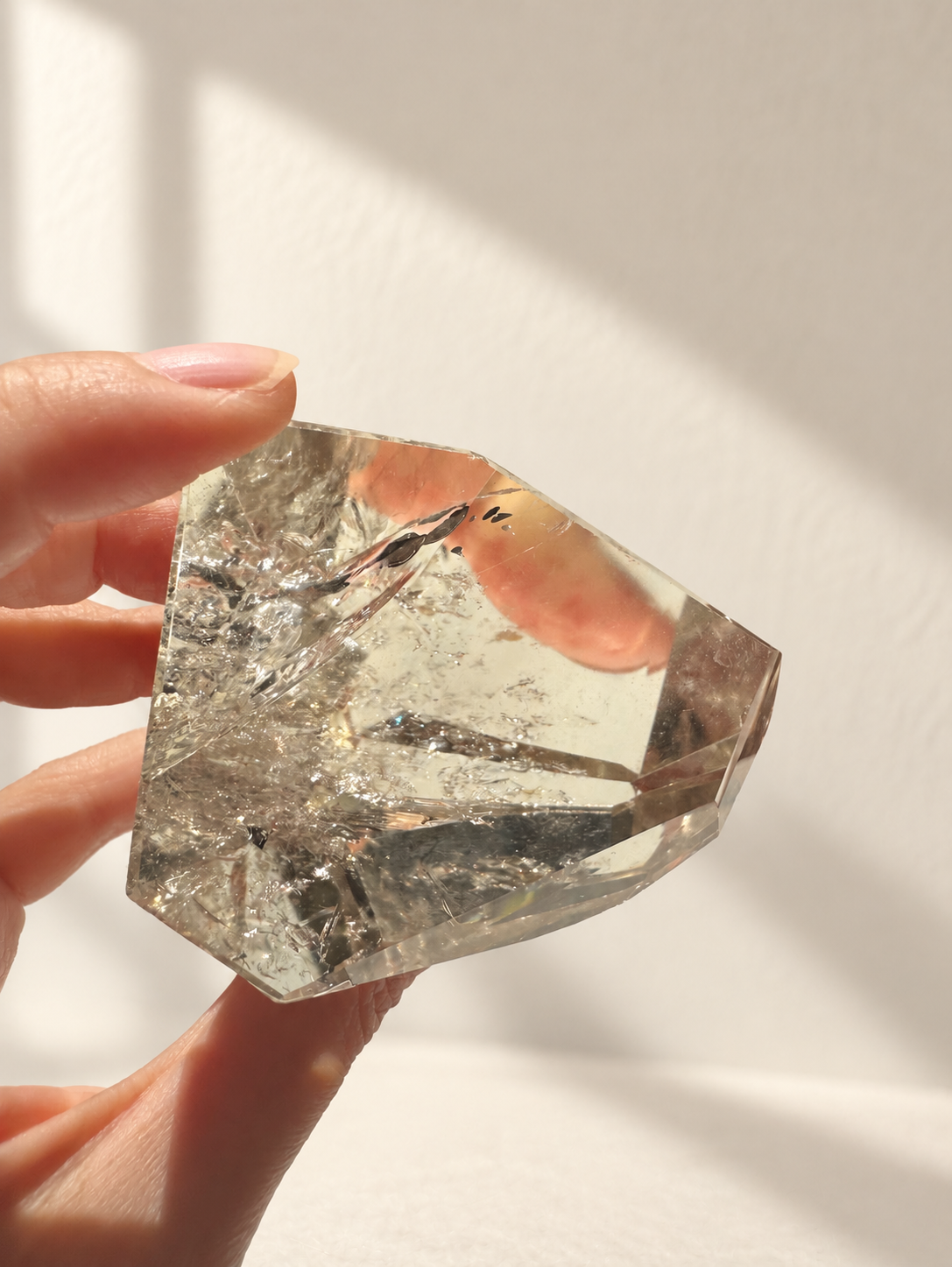 Natural Brazilian citrine 164g exact piece #9 view 7 in soft natural daylight against warm ivory wall