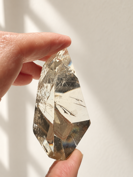 Exact citrine piece #8, 78g — main photo with soft indoor natural light and cream wall background