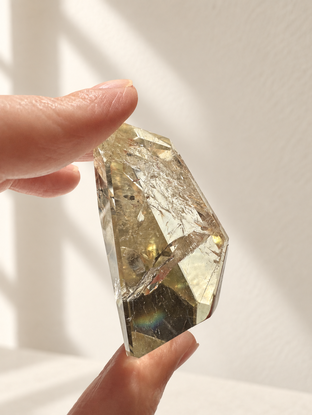 Natural Brazilian citrine 78g exact piece #8 view 10 in soft natural daylight against warm ivory wall