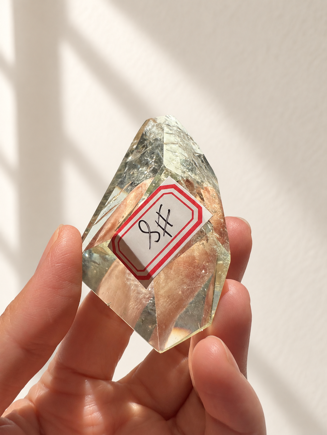 Natural Brazilian citrine 78g exact piece #8 view 13 in soft natural daylight against warm ivory wall