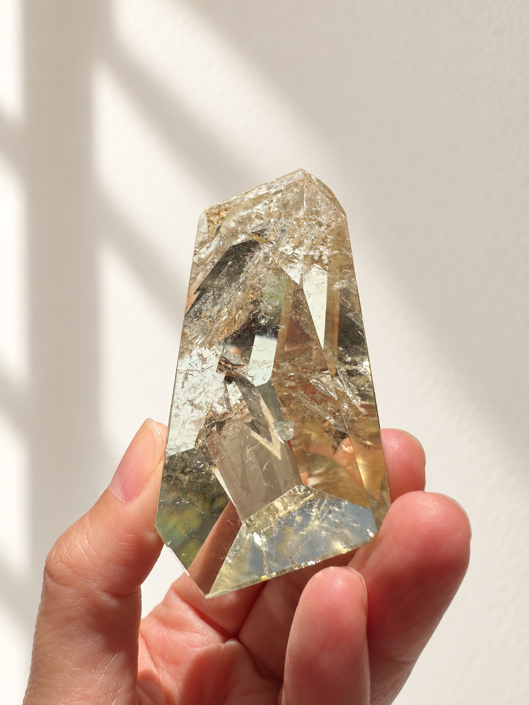 Natural Brazilian citrine 78g exact piece #8 view 14 in soft natural daylight against warm ivory wall