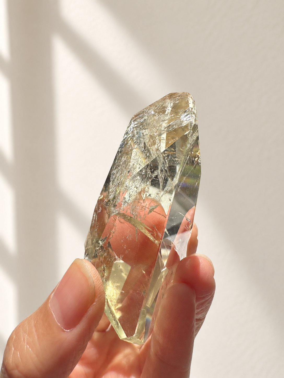 Natural Brazilian citrine 78g exact piece #8 view 15 in soft natural daylight against warm ivory wall