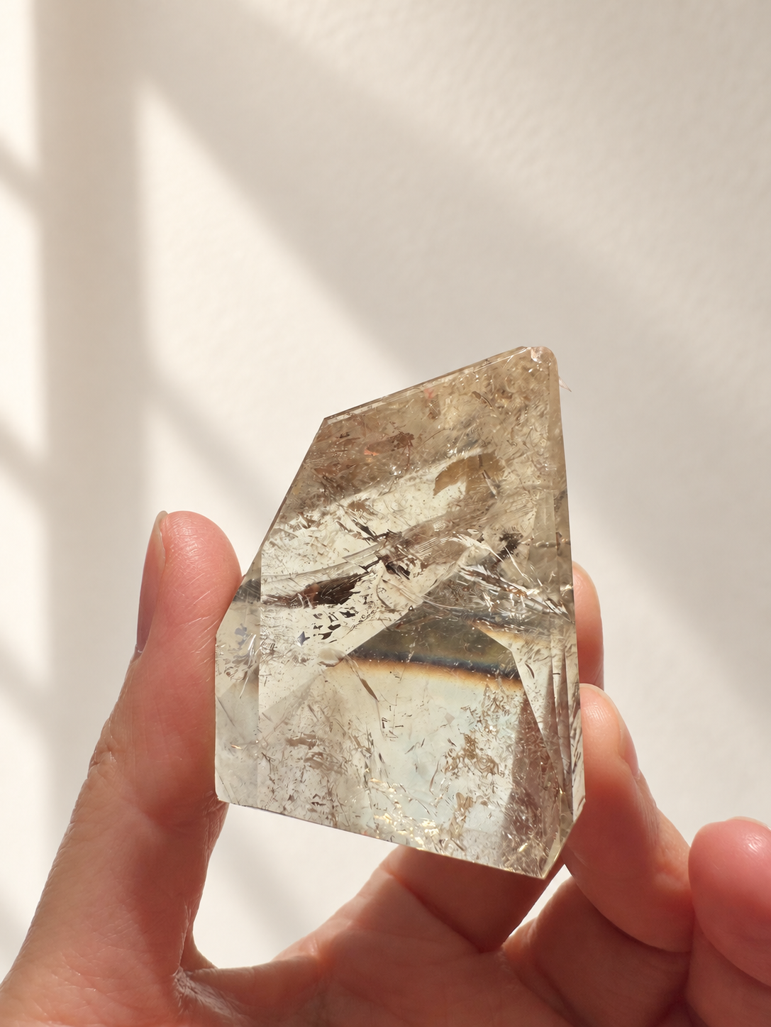Natural Brazilian citrine 81g exact piece #3 view 3 in soft natural daylight against warm ivory wall