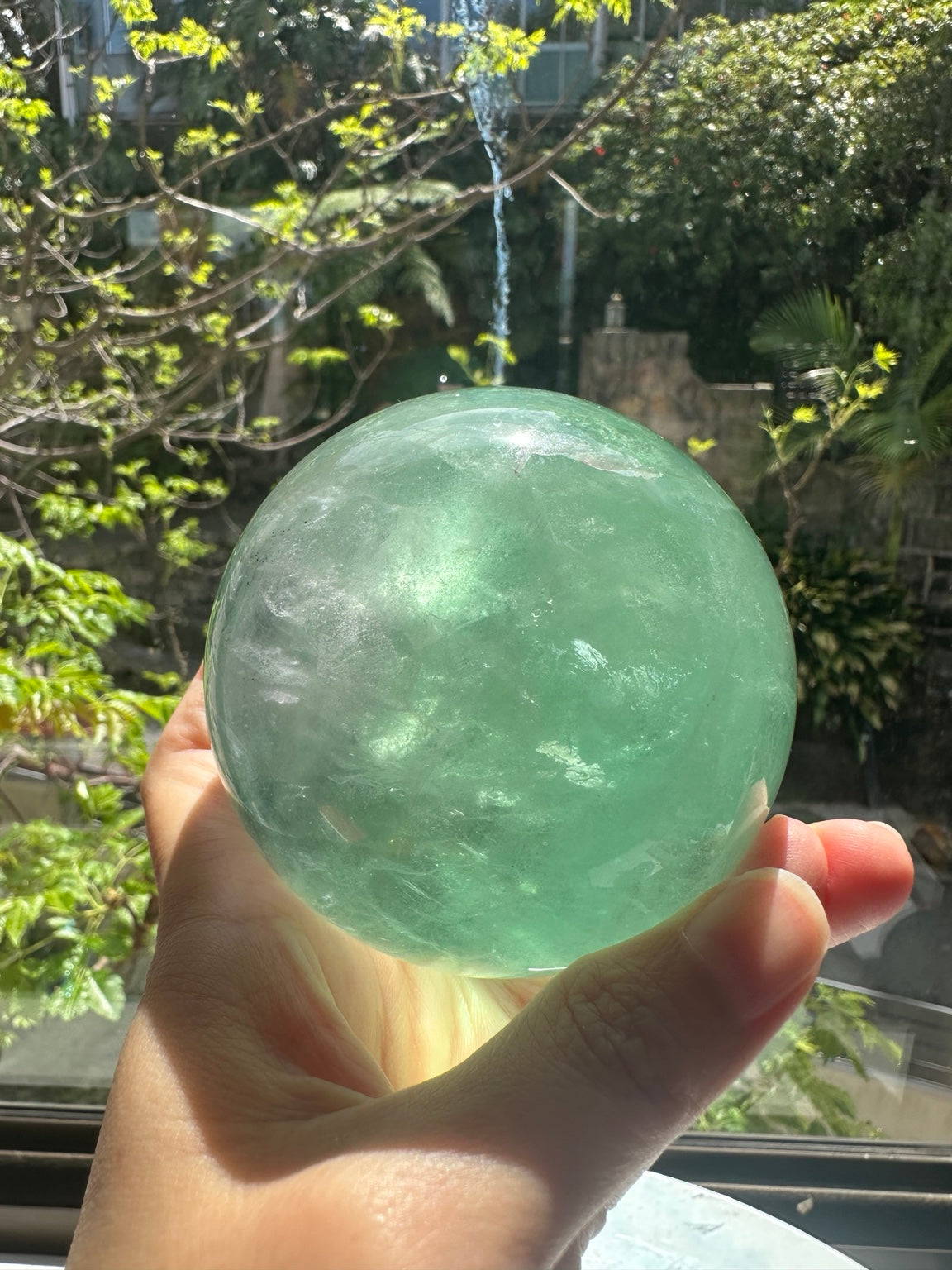 Unedited natural-light original of Madagascar green fluorite sphere #2 787g, view 2