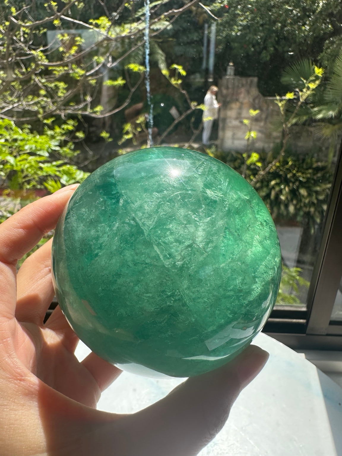 Unedited natural-light original of Madagascar green fluorite sphere #4 925g, view 2