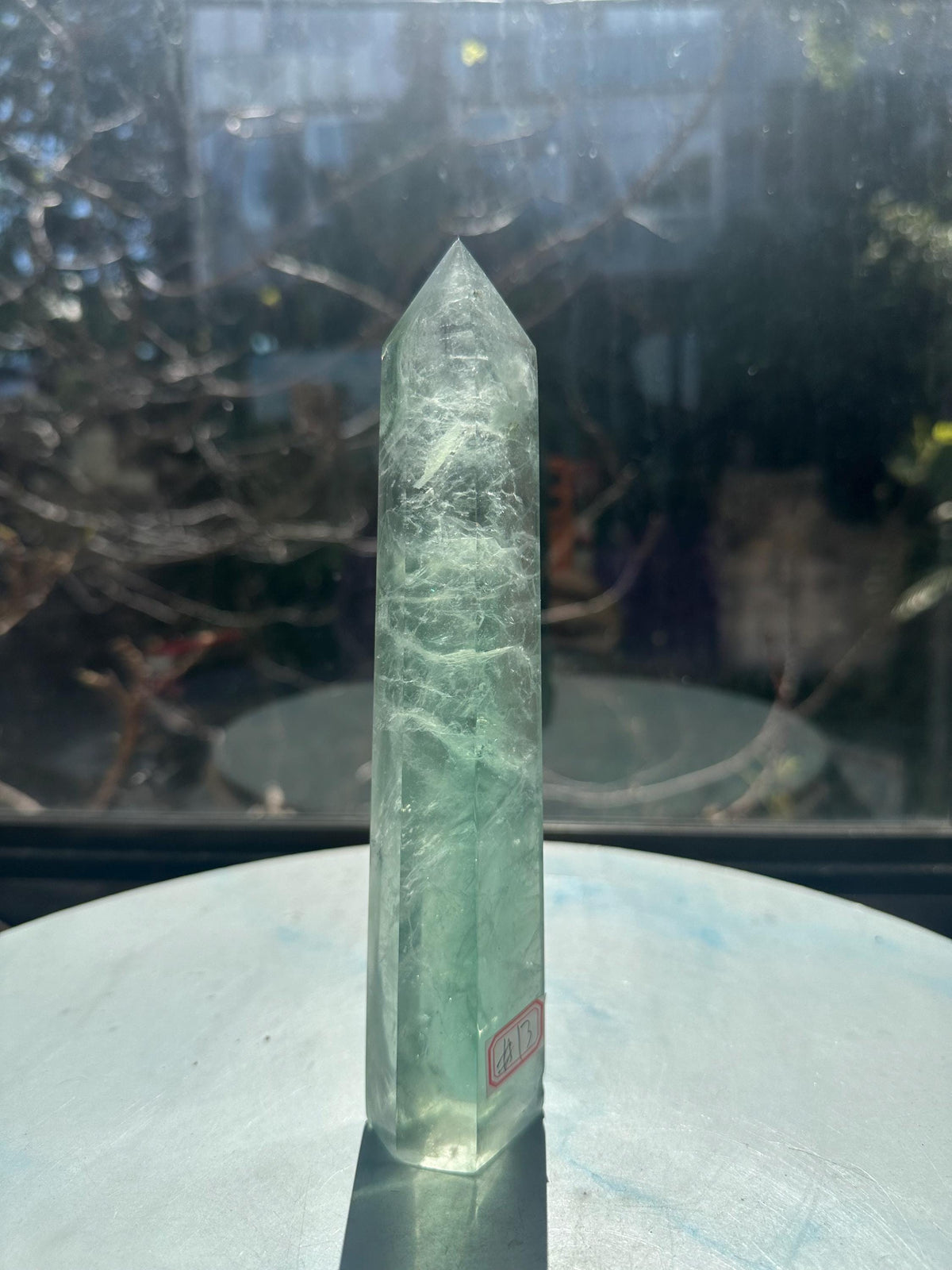 Side view of exact 577g 19cm green Rainbow Fluorite tower #13