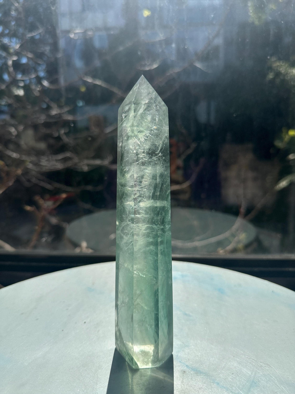 Detail view of horizontal banding in exact 577g 19cm green Rainbow Fluorite tower #13