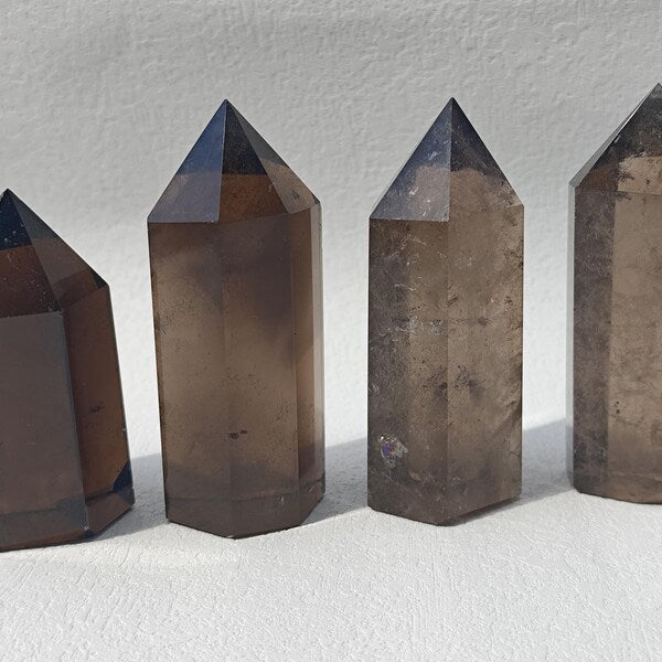 Brazilian Smoky Quartz crystal point with translucent smoky colour and polished facets