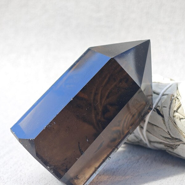 Smoky Quartz crystal point in deep tea-brown to smoky-grey quartz
