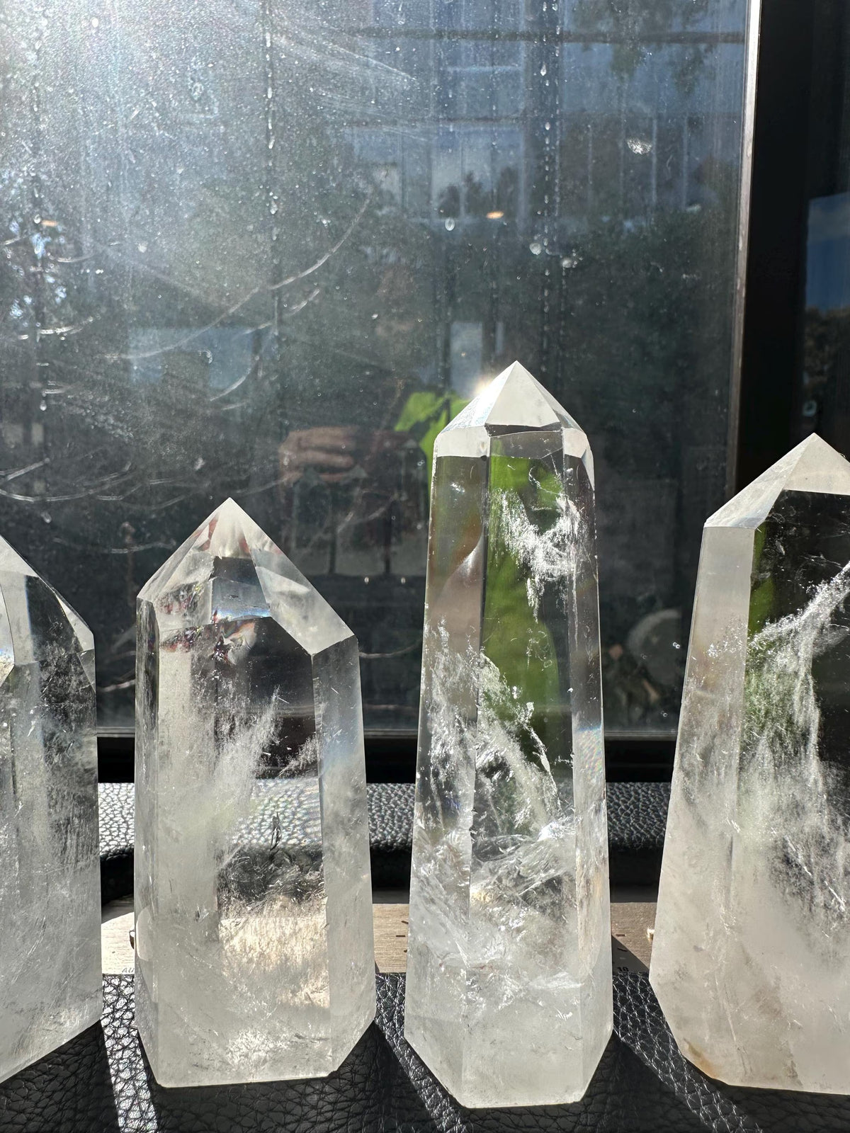 Brazilian Clear Quartz tower side view with natural inclusions