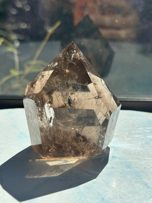 Premium light champagne smoky quartz tower with vibrant internal rainbows, a signature Moon Rituals specimen.