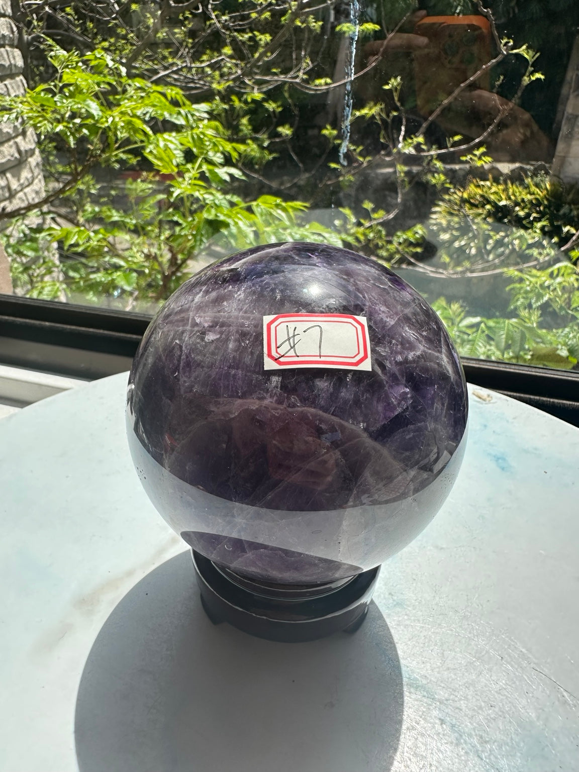 Original natural-light photograph of Dream Amethyst sphere #7, numbered view