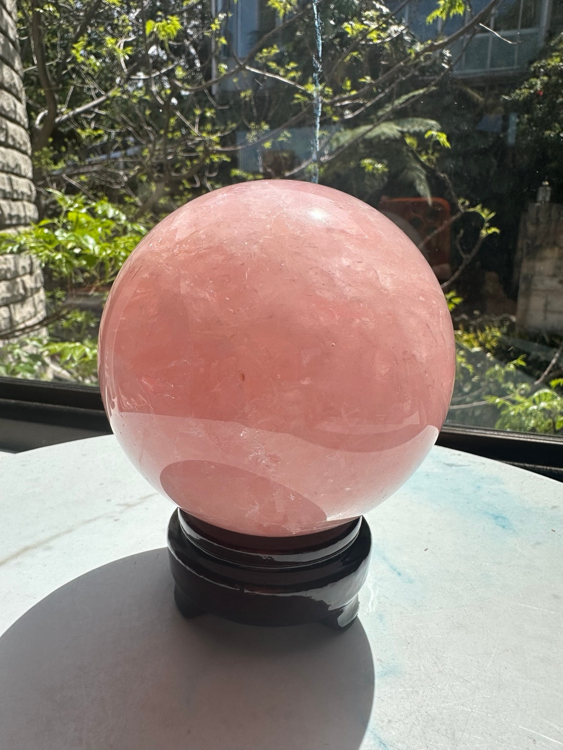Original unedited natural-light photograph of Madagascar rose quartz sphere #1, 1.62kg, 10.6cm