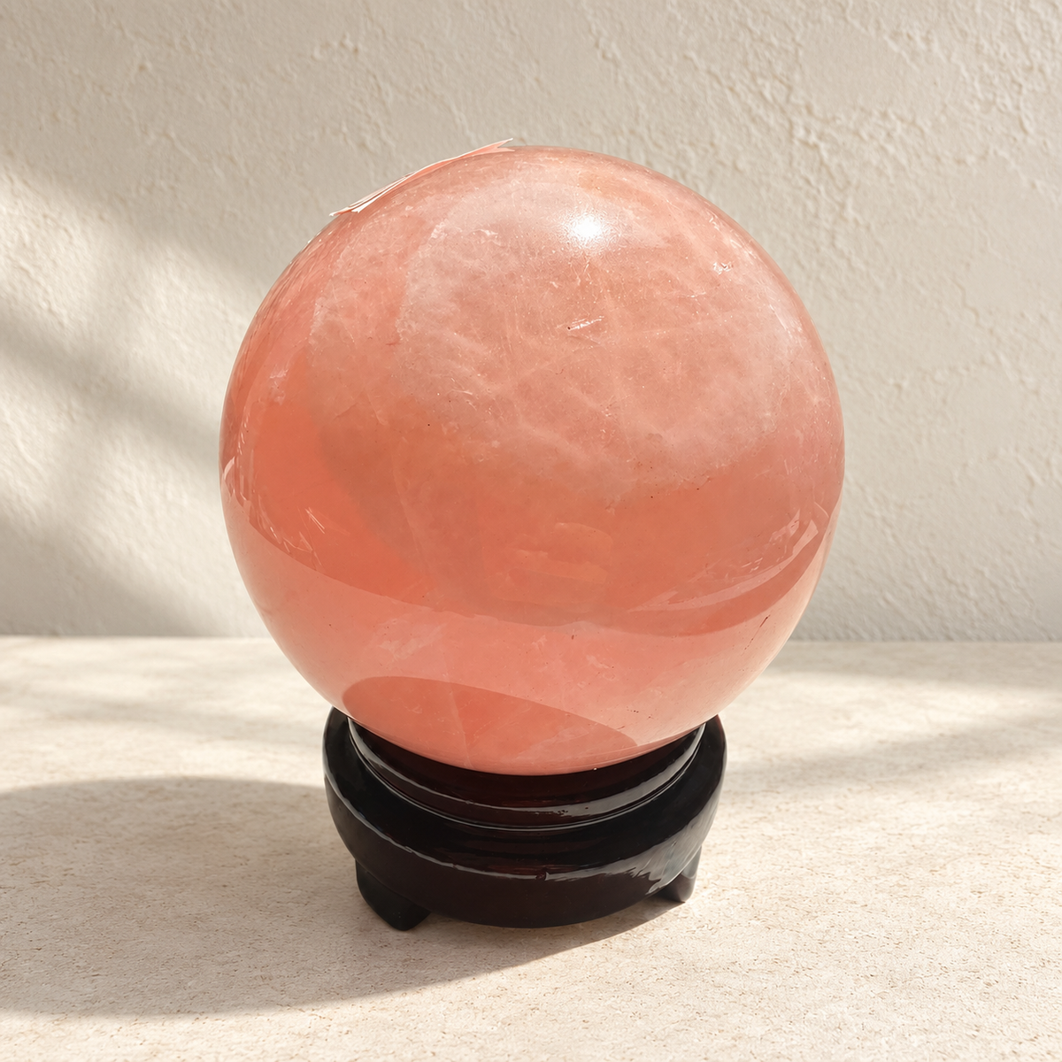 Exact Madagascar rose quartz sphere #4 with stand, 936g, 9cm / approximately 3.54 inches; side