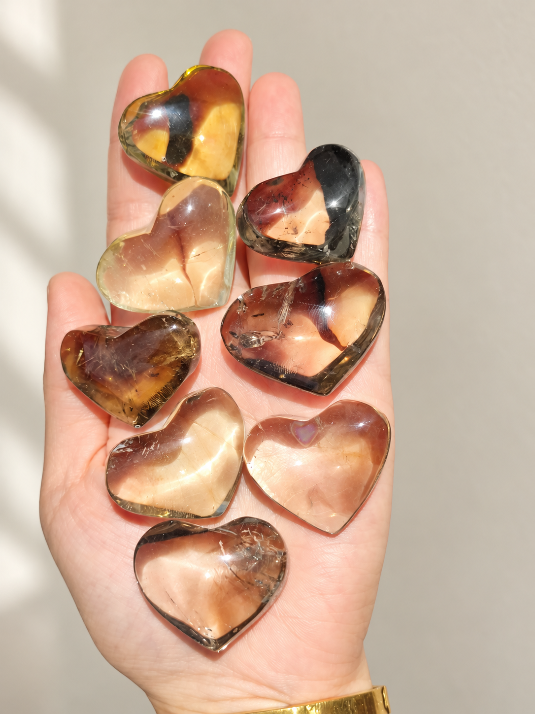 Brazilian Citrine Puffy Heart, detailed view 2 in soft indoor light.