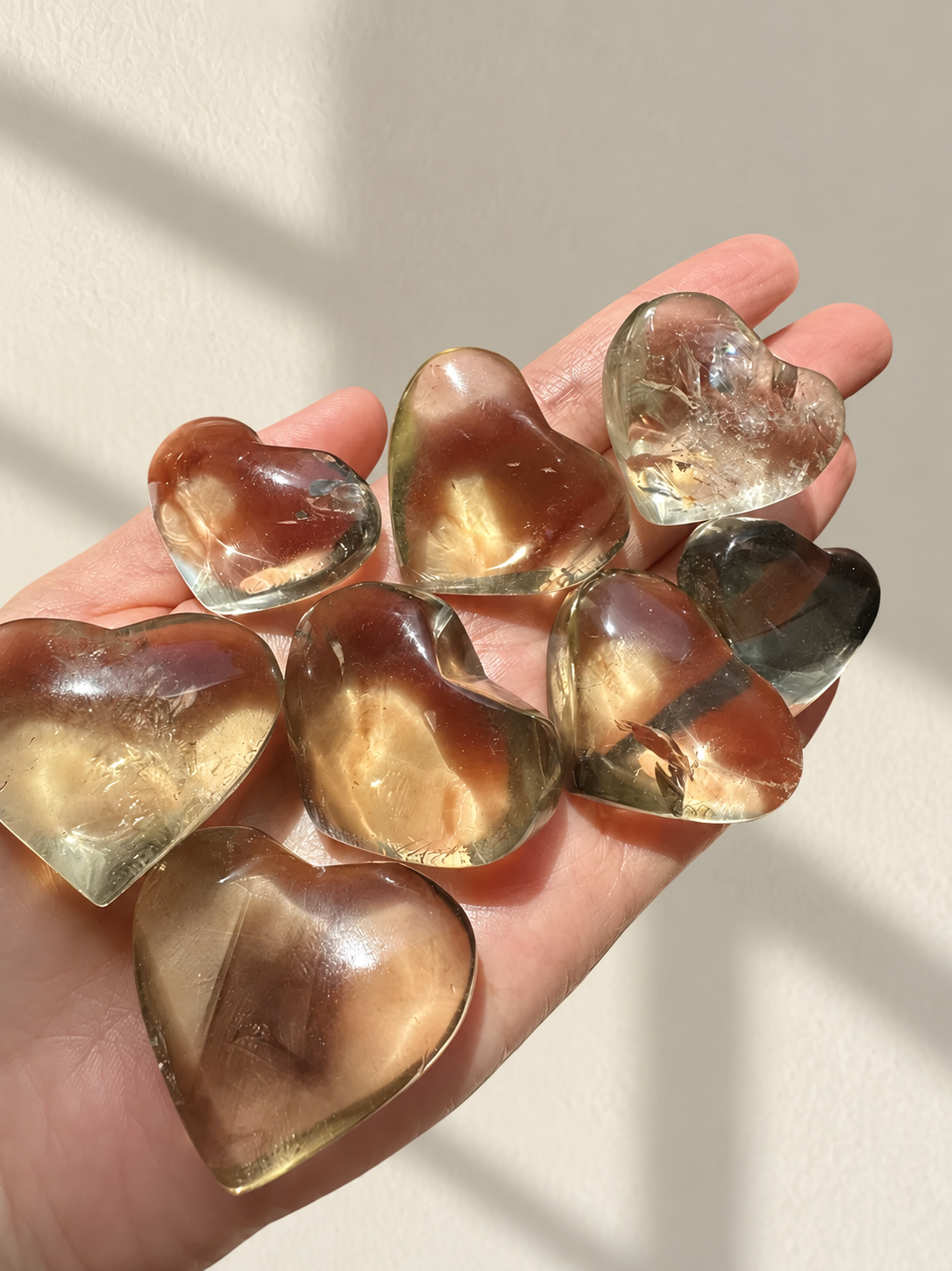Brazilian Citrine Puffy Heart, detailed view 3 in soft indoor light.
