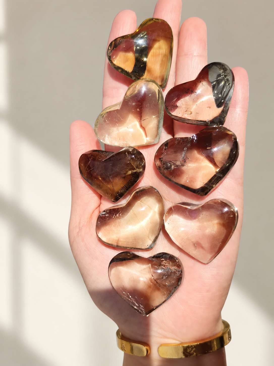 Brazilian Citrine Puffy Heart, detailed view 5 in soft indoor light.