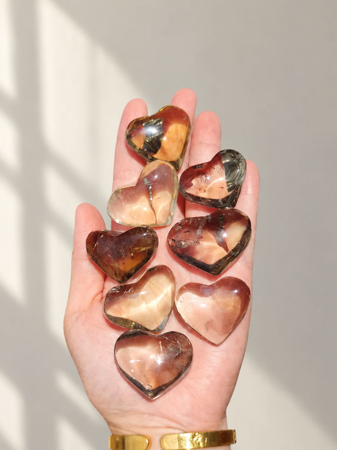 Brazilian Citrine Puffy Heart, detailed view 6 in soft indoor light.