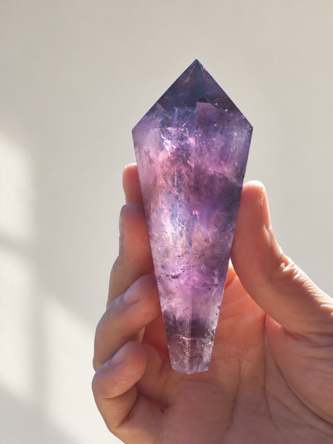 Brazilian Amethyst Wand, detailed view 4 in soft indoor light.