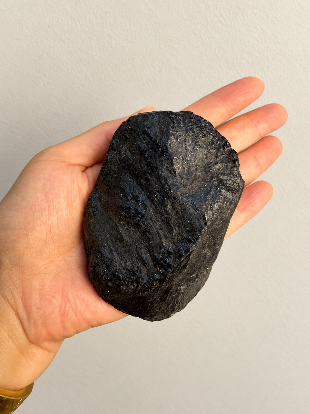 Large Raw Black Tourmaline Chunk, detailed view 7 in soft indoor light.