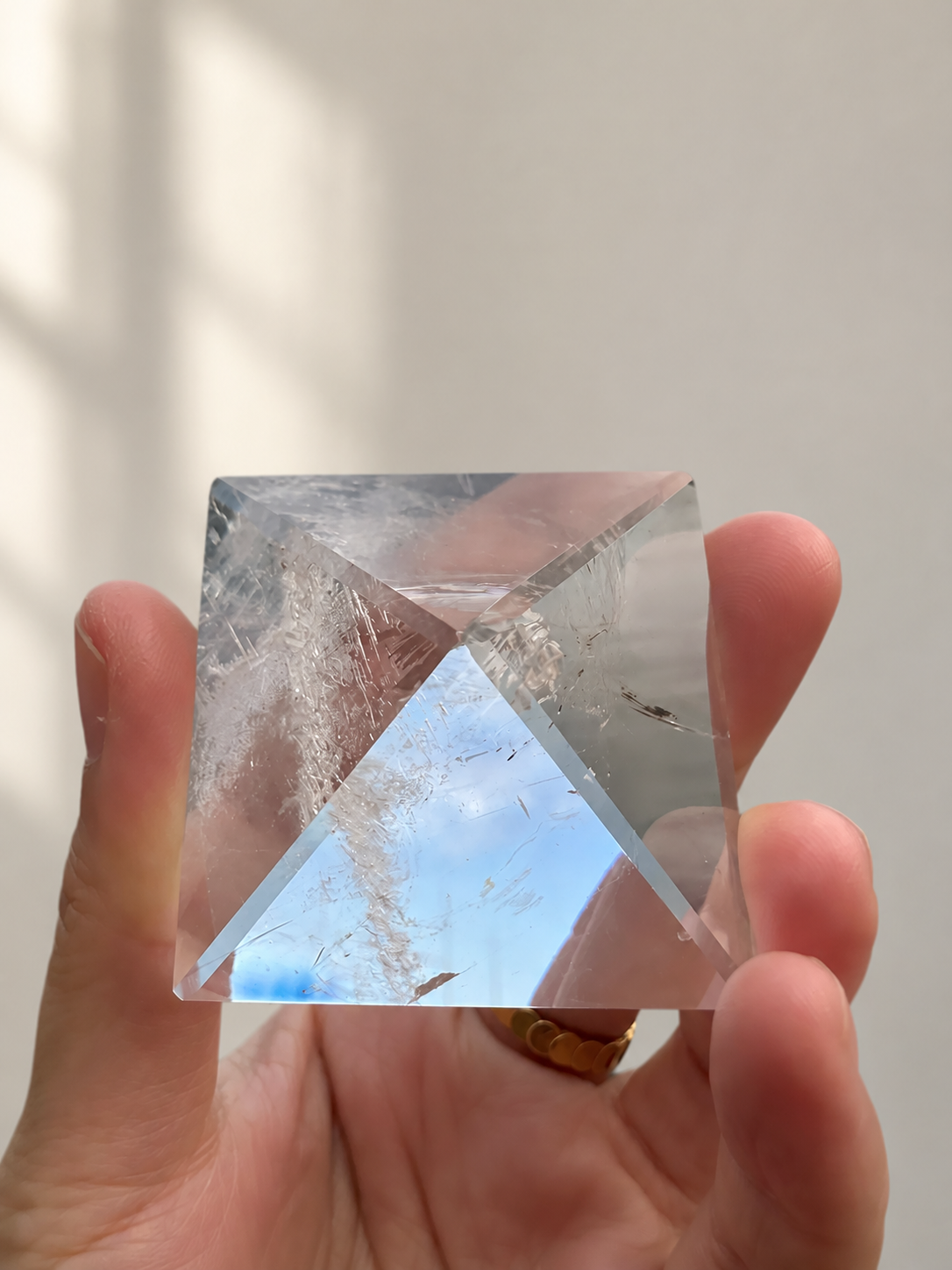 Natural Clear Quartz Pyramid, detailed view 6 in soft indoor light.