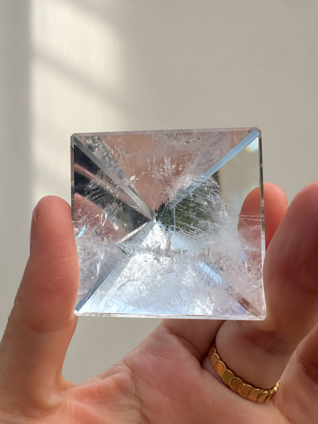 Natural Clear Quartz Pyramid, detailed view 7 in soft indoor light.