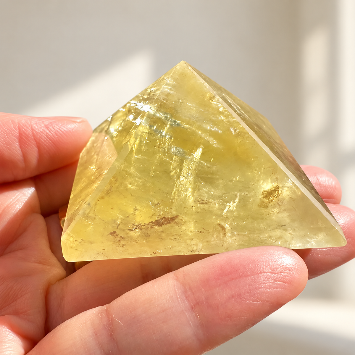 Citrine Pyramid, detailed view 3 in soft indoor light.