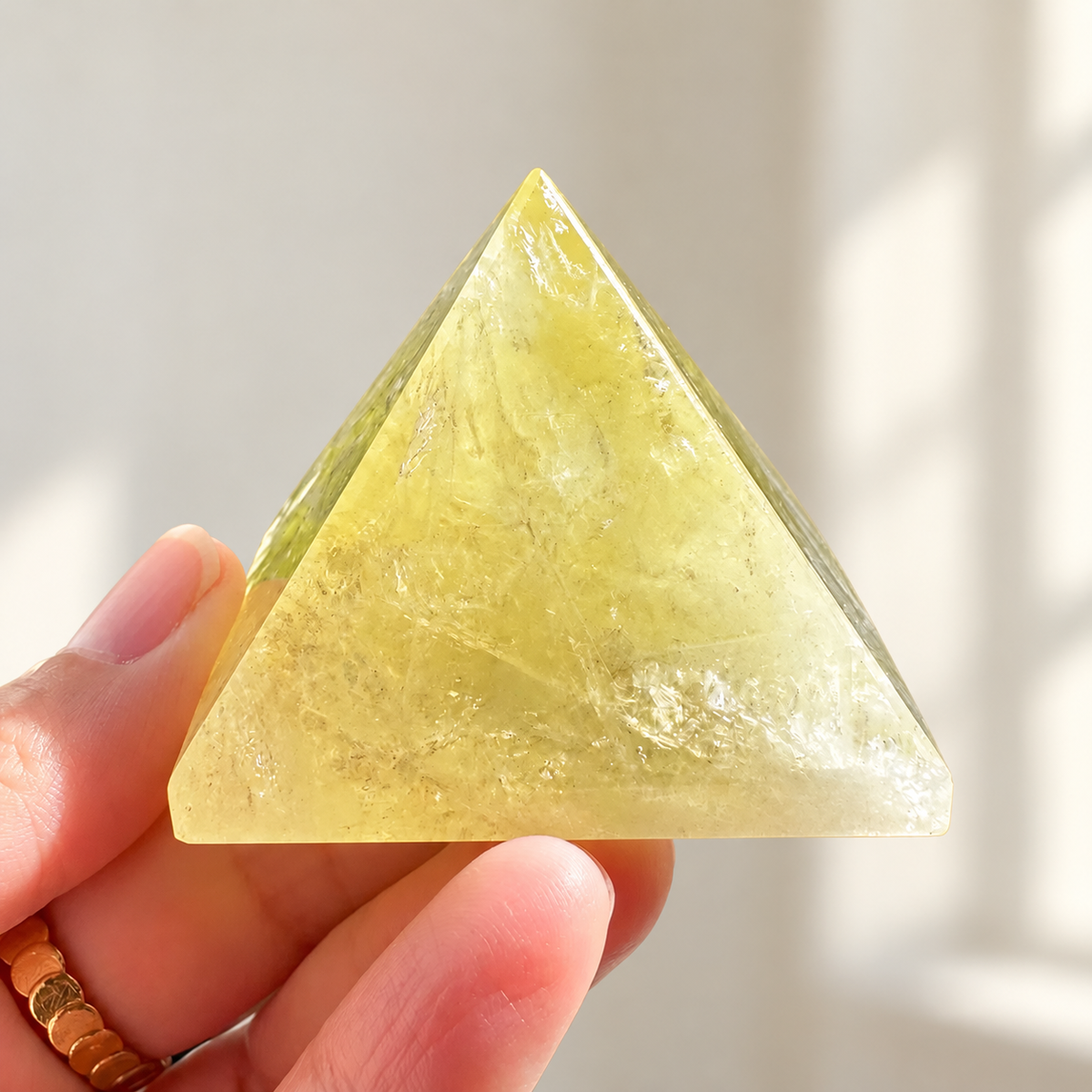Citrine Pyramid, detailed view 4 in soft indoor light.