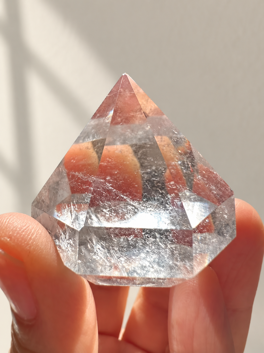 Clear Quartz Diamond, detailed view 5 in soft indoor light.