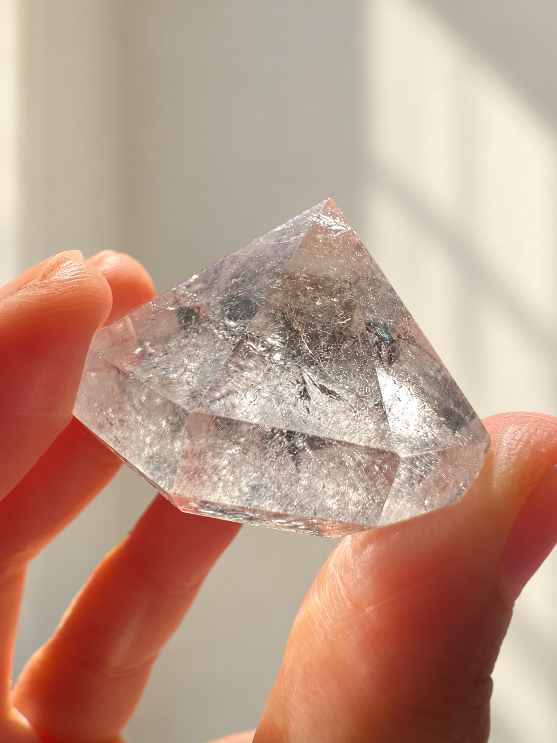 Clear Quartz Diamond, detailed view 6 in soft indoor light.