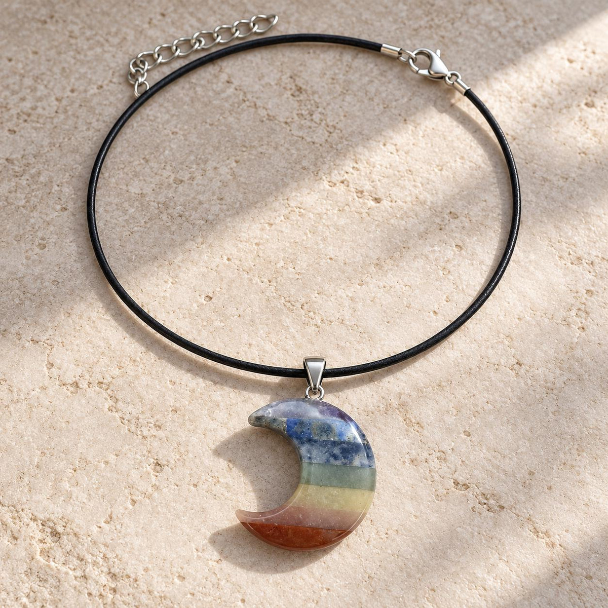 Madagascar seven chakra crescent moon crystal necklace with black cord