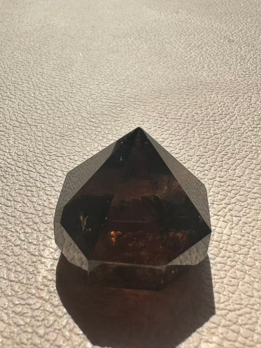 Deep Smoky Quartz Diamond #7 showing internal rainbows, natural dark polished crystal for home office protection and grounding energy, Moon Rituals Sydney.