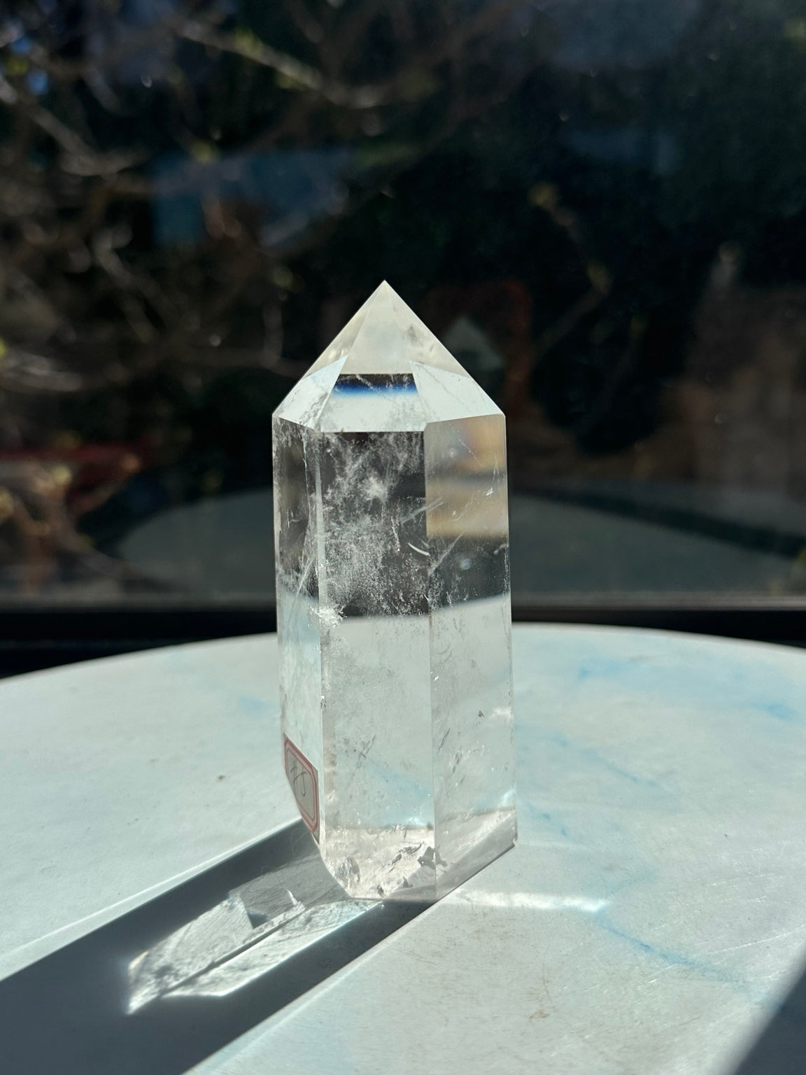 Side angle of quartz tower #5 with natural internal textures and polished faces