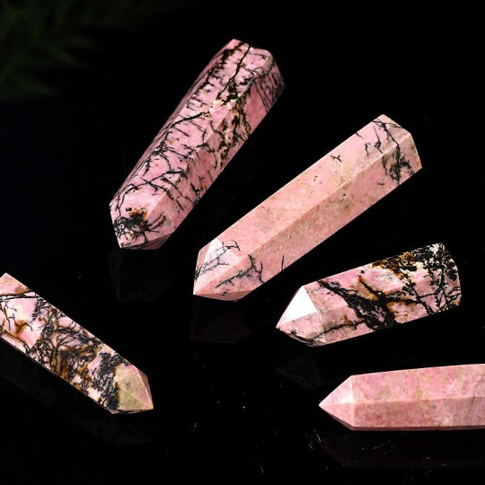 Polished Rhodonite tower detail with pink and charcoal mineral pattern