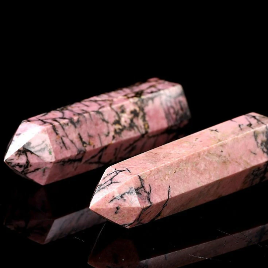 Natural Rhodonite crystal point product view from another angle