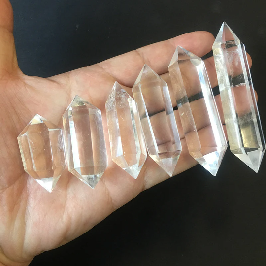 Double terminated Clear Quartz point showing natural inclusions